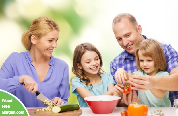 Family enjoying a dinner of garden-fresh food